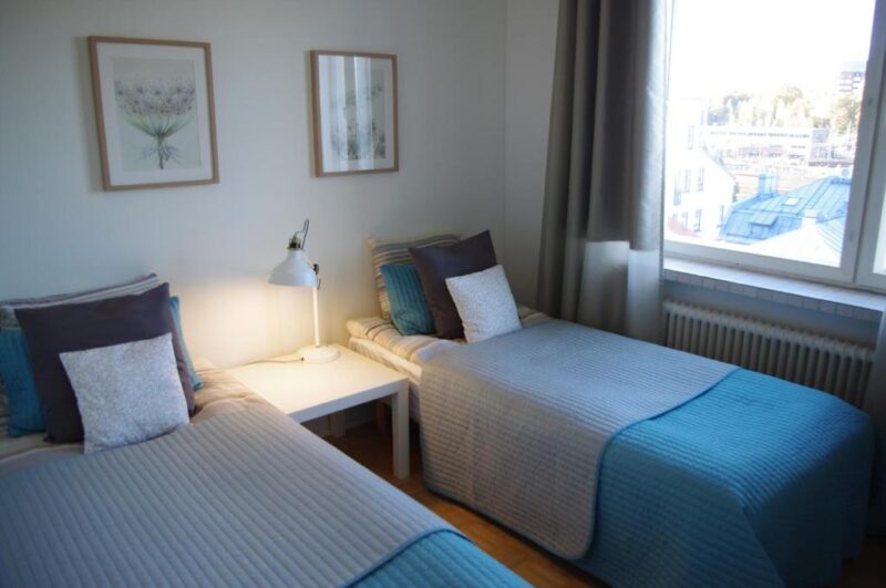 Две односпальные кровати в апартаментах Borent Suite 4*