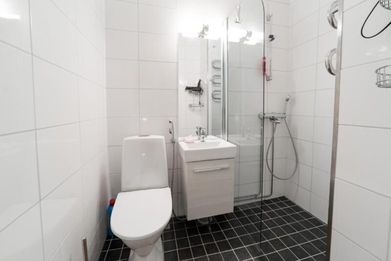 Ванная комната в апартаментах Kotimaailma Apartments Turku 4*