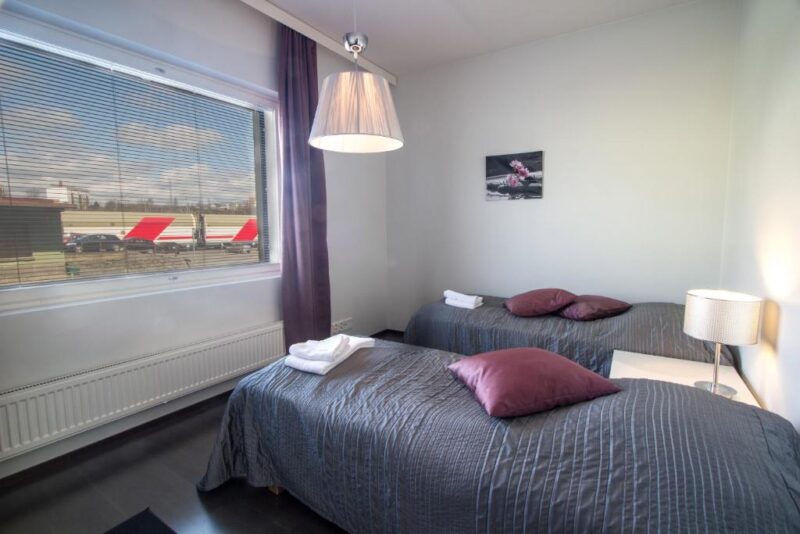 Односпальные кровати в апартаментах Kotimaailma Apartments Turku 4*