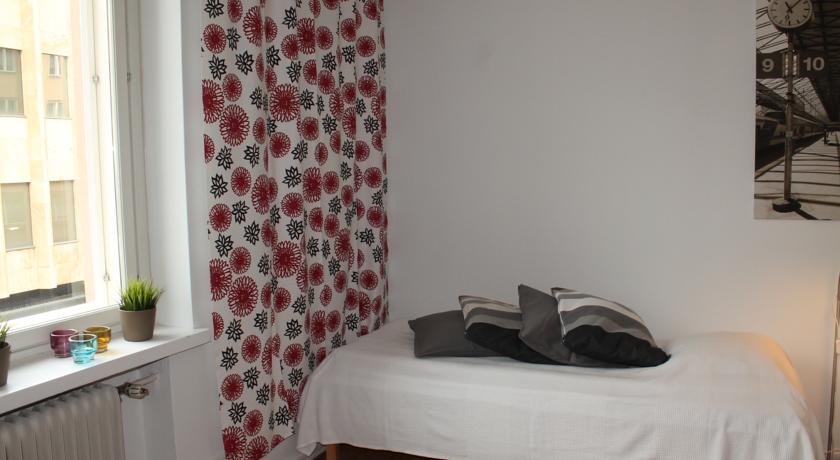 Односпальная кровать в апартаментах Forenom в Турку