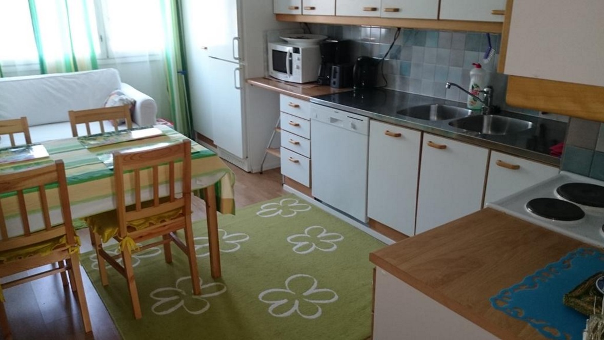 Фото кухни в апартаментах Haltijantie