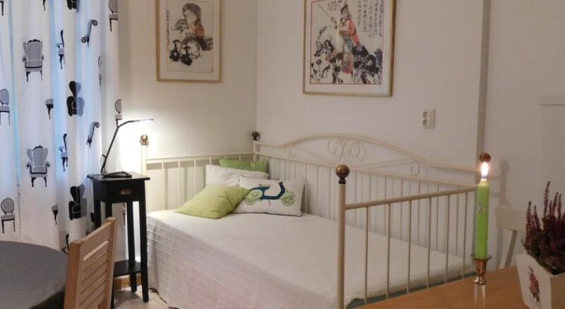 Односпальная кровать в апартаментах Lossiranta