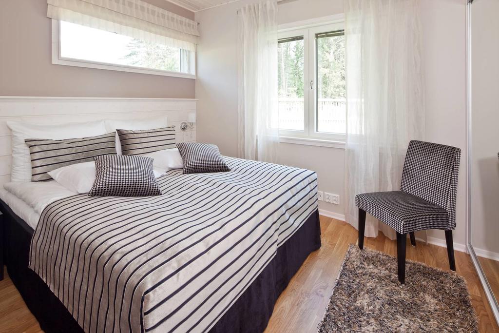 Двухспальная кровать в Holiday Club Saimaa Apartments 4*