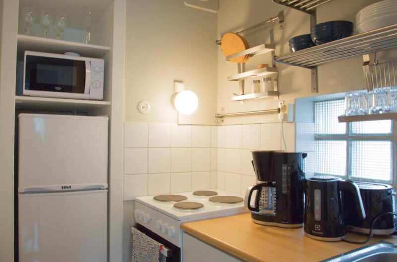 Кофеварка на кухне в апартаментах Borent Suite 4*
